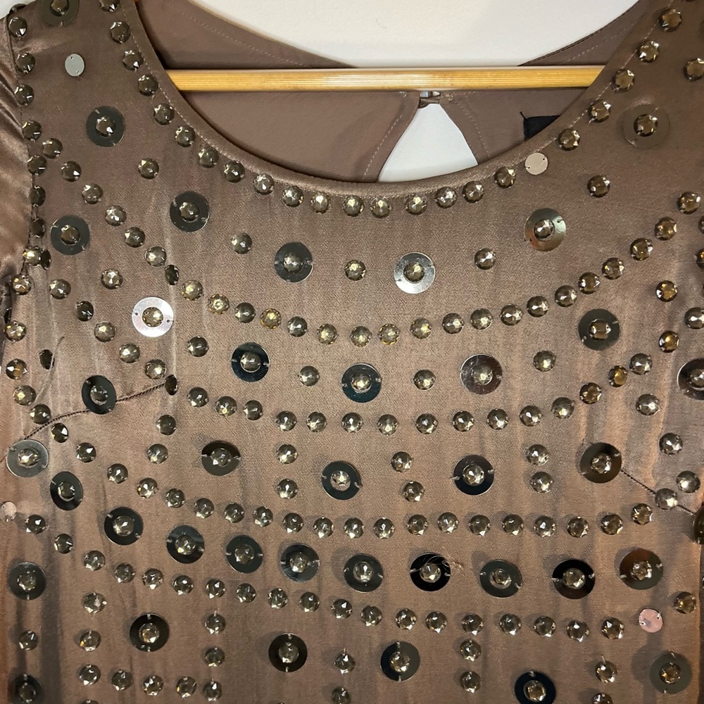 Ochre color, with shining details, size S, Shulami brand.